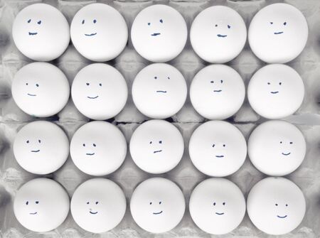 Rows of eggs with smiles 