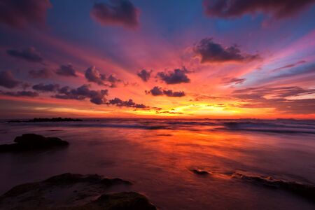 Tropical sunset at the beach. Thailandの写真素材
