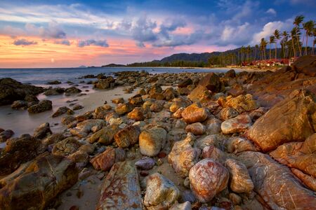 Tropical sunset at the beach. Thailandの写真素材