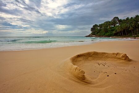 gloomy weather at tropical beachの写真素材