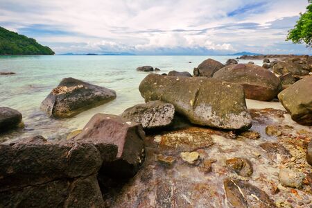 Beautiful exotic tropical beach with stones. Thailand の写真素材