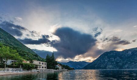 Gloomy sunset on the sea with the mountains  Montenegroの写真素材