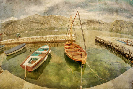 A small bay with boats in retro style  Kotor  Montenegro