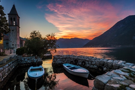  Sunset on the sea with the Ð° foggy mountains  Montenegro