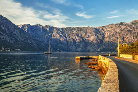 seafront with sea and mountain views in sunlights   Montenegroの写真素材