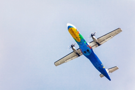 Air plane on a background of the sky with clouds の写真素材