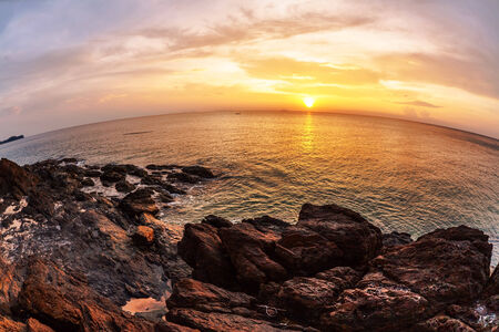 Tropical beach at beautiful sunset in fish-eye lense. Nature backgroundの写真素材