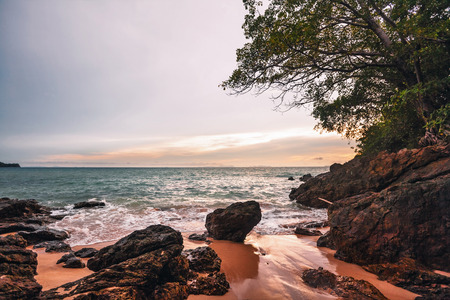 Gloomy tropical sunset at the beach. Thailandの写真素材