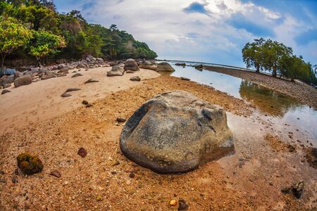fisheye view on beach with gloomy sky