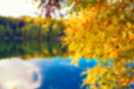 autumnal lake near the forest defocus Nature backgroundの写真素材