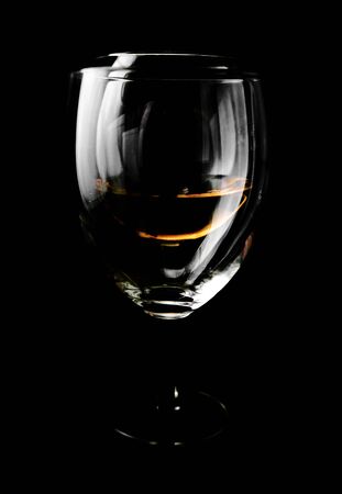 Glass of wine on black backgroundの写真素材