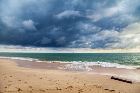 Gloomy tropical sunset at the beach. Thailandの写真素材