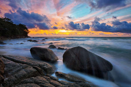 Rocks at topical beach at beautiful sunset. Nature backgroundの写真素材