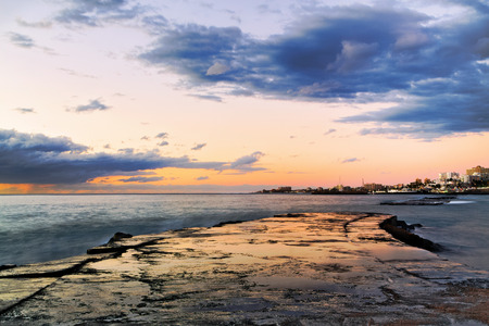 Old stone pier in sunset time at Tenerife, Canary Islands, Spainの写真素材
