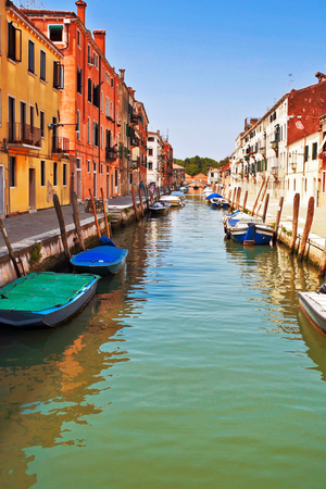 Boats in canals of Venice. Italyの写真素材