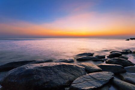 Rocks at topical beach at beautiful sunset. Nature backgroundの写真素材