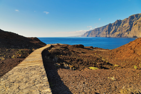 View of sea and cliffs near a Punto Teno lighthouse.Tenerife. Canary Islands. Spainの写真素材