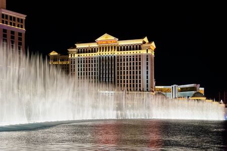 LAS VEGAS - MAY 2, 2007: The Caesars Palace Hotel is shown behind some of the fountains of the Bellagio Hotel (not shown) in Las Vegas, Nevada. Caesars opened in 1966.のeditorial素材