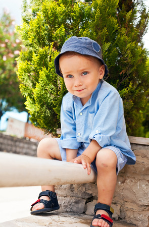 Portrait of a happy blue-eyed child boy.の写真素材