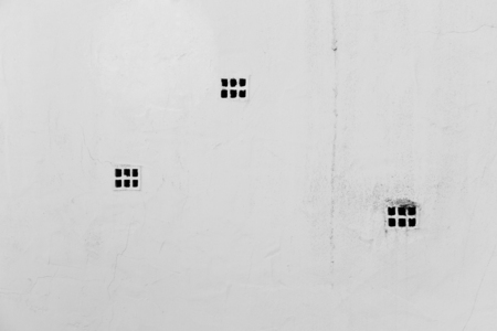 ventilation holes on the old plastered wallの写真素材