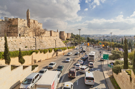 JERUSALEM, ISRAEL - DECEMBER 26, 2016: A road traffic along the wall of the old city of Jerusalem near the Jaffa gateのeditorial素材