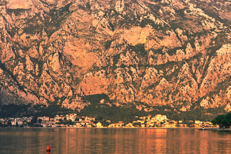 Sea sunset on mountains background. Kotors bay. Montenegro
