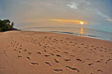 Tropical beach at beautiful sunset in fish-eye lense. Nature background の写真素材