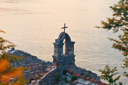 The old church near the sea in sunset time. Montenegroの写真素材