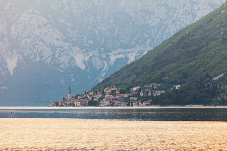 Evening in sea town on mountains background. Montenegroの写真素材