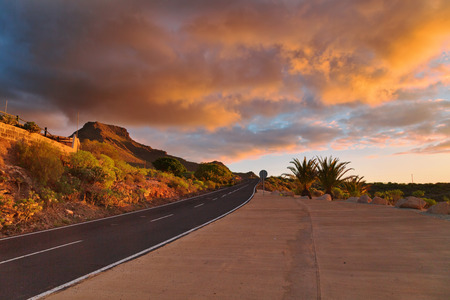 Road in the mountain under sunset sky. Tenerife, Canary Islands. Spainの写真素材