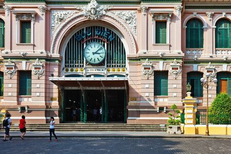 HO CHI MINH, VIETNAM - APRIL 28, 2014: Customers and tourists at the General Post Office. It was built by the French in 1880s and is now a popular tourist attraction in Ho Chi Minh cityのeditorial素材
