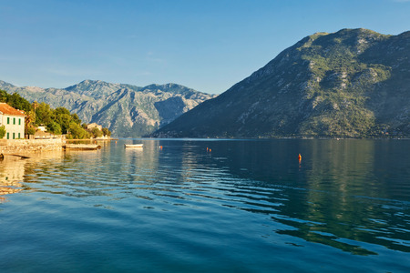 Early misty morning landscape with sea and mountain views. Kotor bay. Montenegroの写真素材