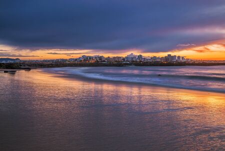 Beautiful seascape with beach, cliffs and ocean. Pintadinho beach. Ferragudo, Lagoa, Algarve, Portugalの写真素材