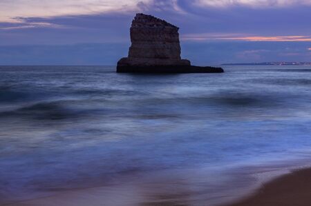 Sunset landscape with views of the cliffs and the coast near Ferragudo. Portugalの写真素材