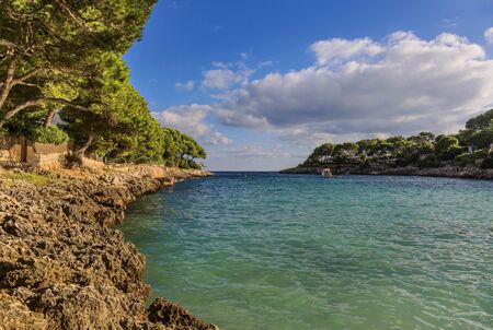 Landscape with rocks over the sea under the sky.Mallorca island, Spain Mediterranean Sea, Balearic Islands.の写真素材