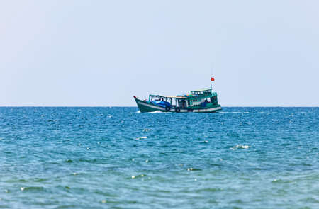 Boats in the tropical sea under blue sky. Vietnamの写真素材