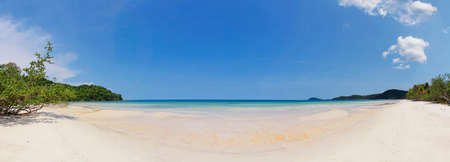 Beautiful tropical beach with sea view, clean water & blue sky at Phu Quoc island in Vietnam. Stitched panoramaの写真素材