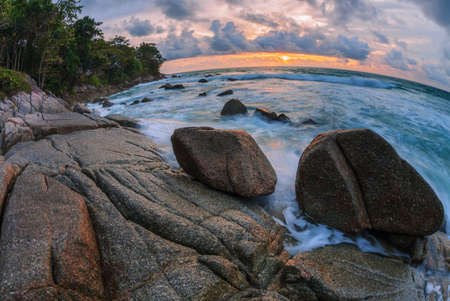 Tropical beach at beautiful sunset in fish-eye lense. Nature backgroundの写真素材