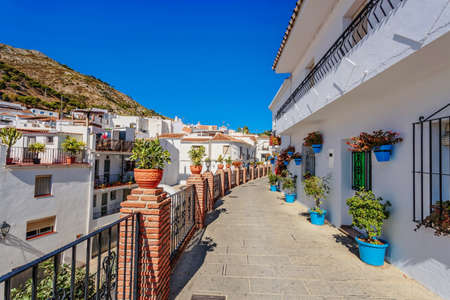 Typical white houses in the narrow street of Mijas town. Andalusia. Spainの写真素材