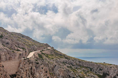 Landscape of rocky coast before a storm under gloomy dramatic sky (cape formentor). Mallorca. Balearic islands. Spainの写真素材