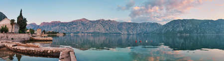 Sea sunset on mountains background. Kotor bay. Montenegro Stitched panoramaの写真素材