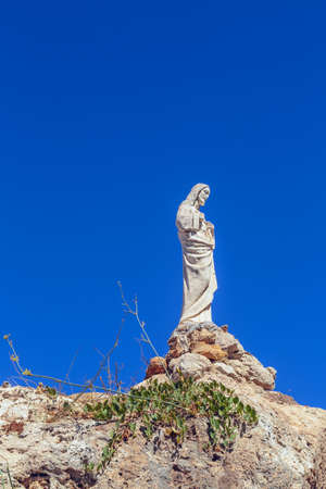 Jesus statue on shrine to the Virgin of the Rock in Mijas. Mijas is a lovely Andalusian town on the Costa del Sol. Spainの写真素材