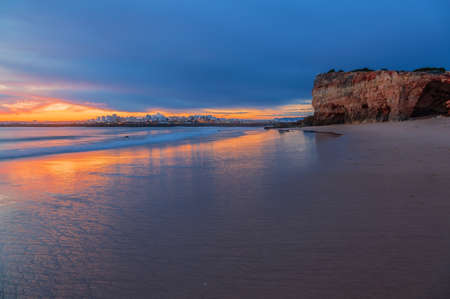 Beautiful seascape with beach, cliffs and ocean. Pintadinho beach. Ferragudo, Lagoa, Algarve, Portugalの写真素材