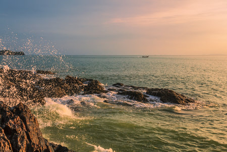 Beautiful sunset on the rock beach. Phuket, Thailandの写真素材