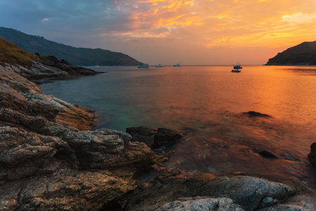 Beautiful sunset on the rock beach. Phuket, Thailandの写真素材