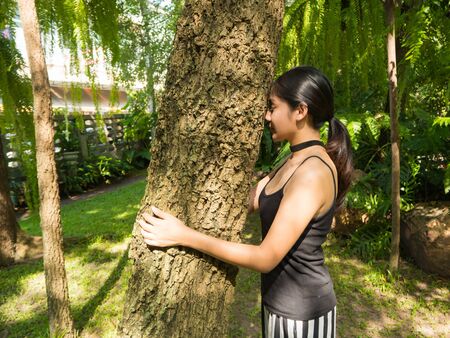 Asian woman in the garden, concept save the worldの写真素材