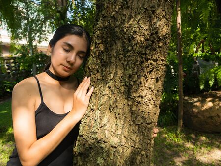 Asian woman in the garden, concept save the worldの写真素材