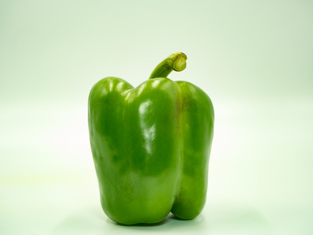 Green paprika on white background, sweet pepper, bell pepperの写真素材