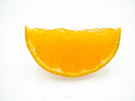 Slice of orange on isolated white backgroundの写真素材