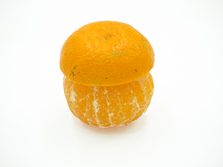 Slice of orange on isolated white backgroundの写真素材